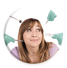 Woman smiling nervously at dental implements