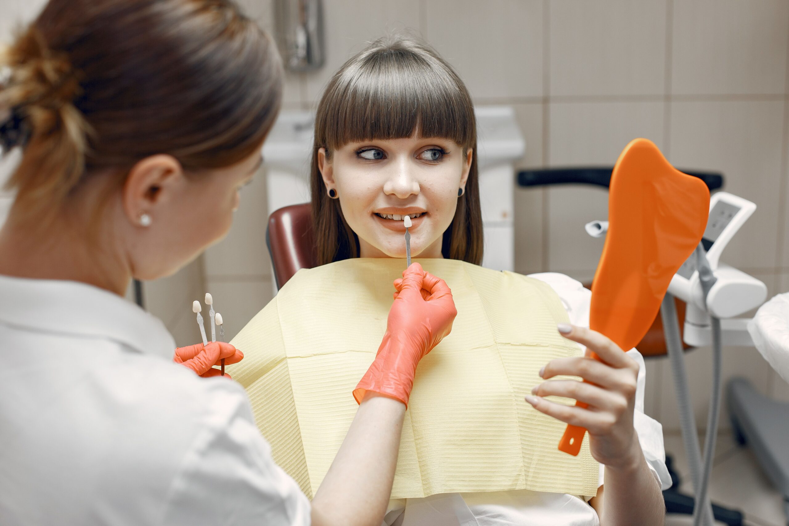 A young patient learning about dental care