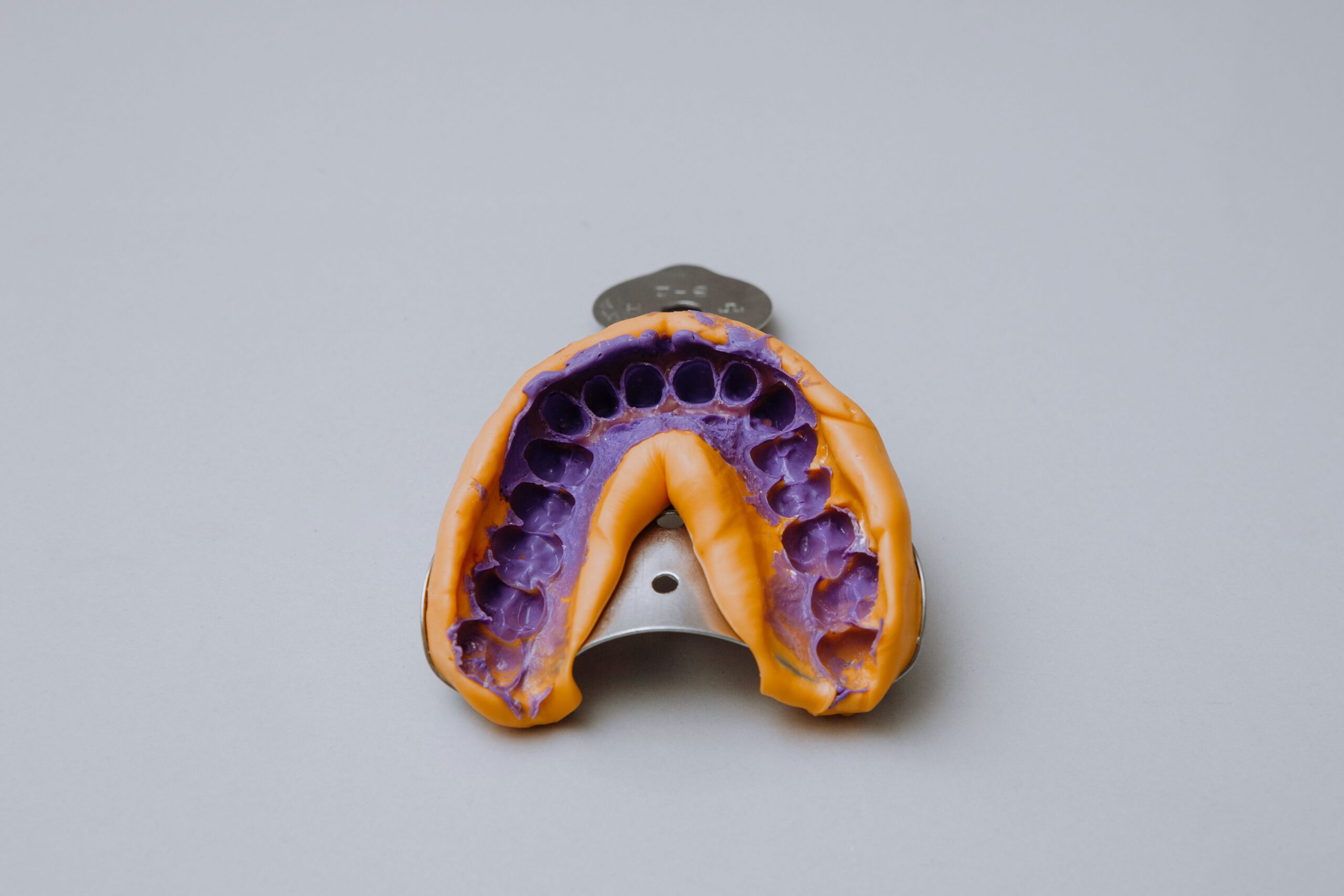 A dental model with a custom clear mouthguard