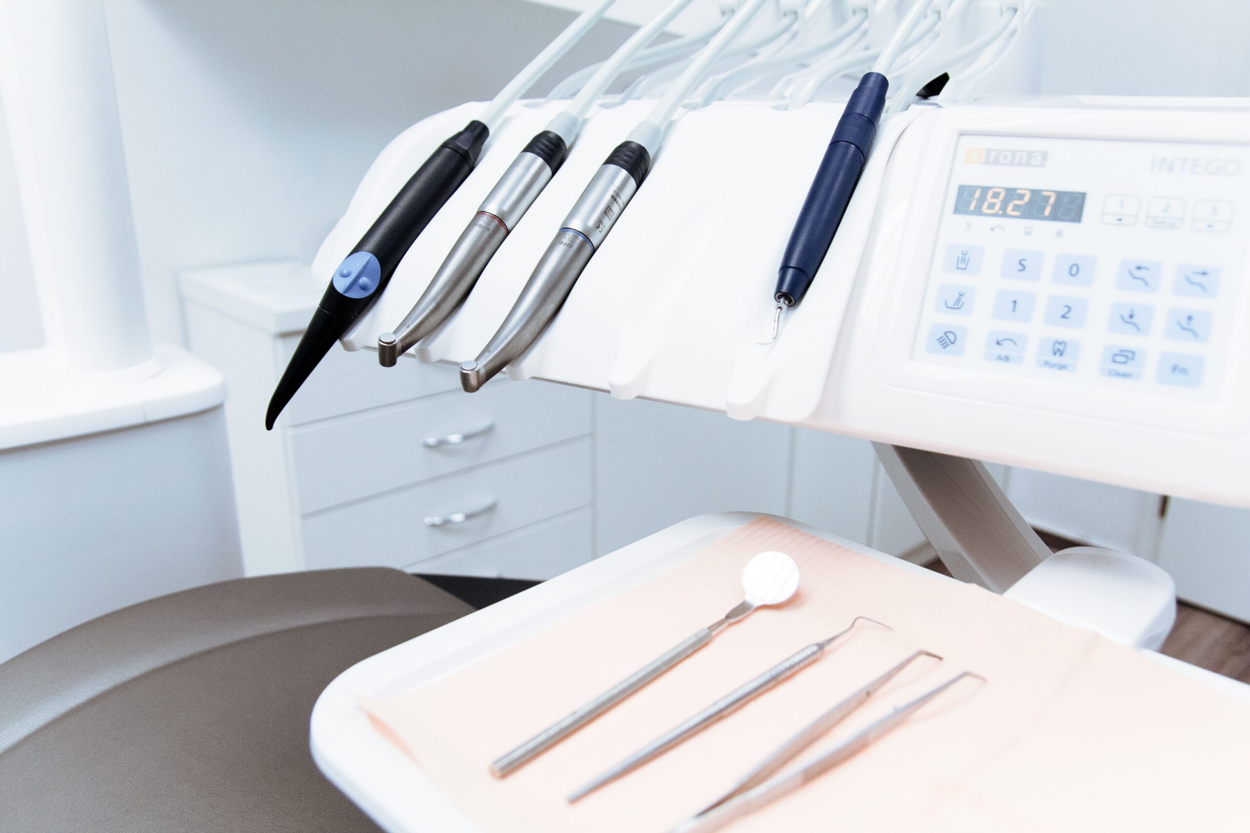 A patient discussing a tooth concern with a dentist