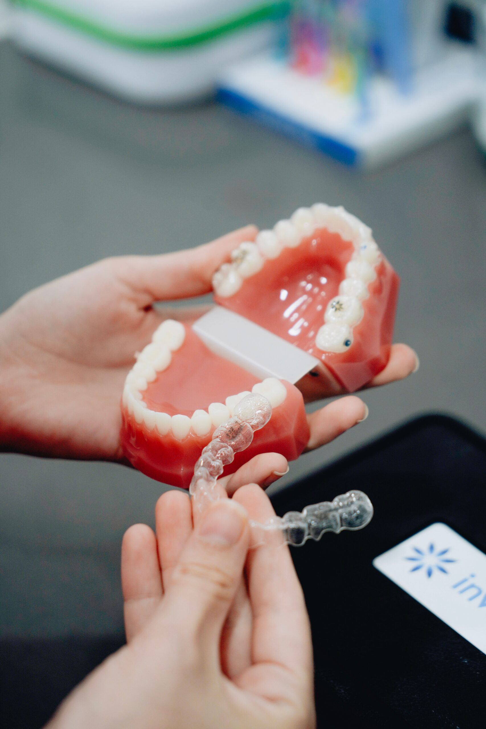 A dental professional discussing a tooth shade with a patient