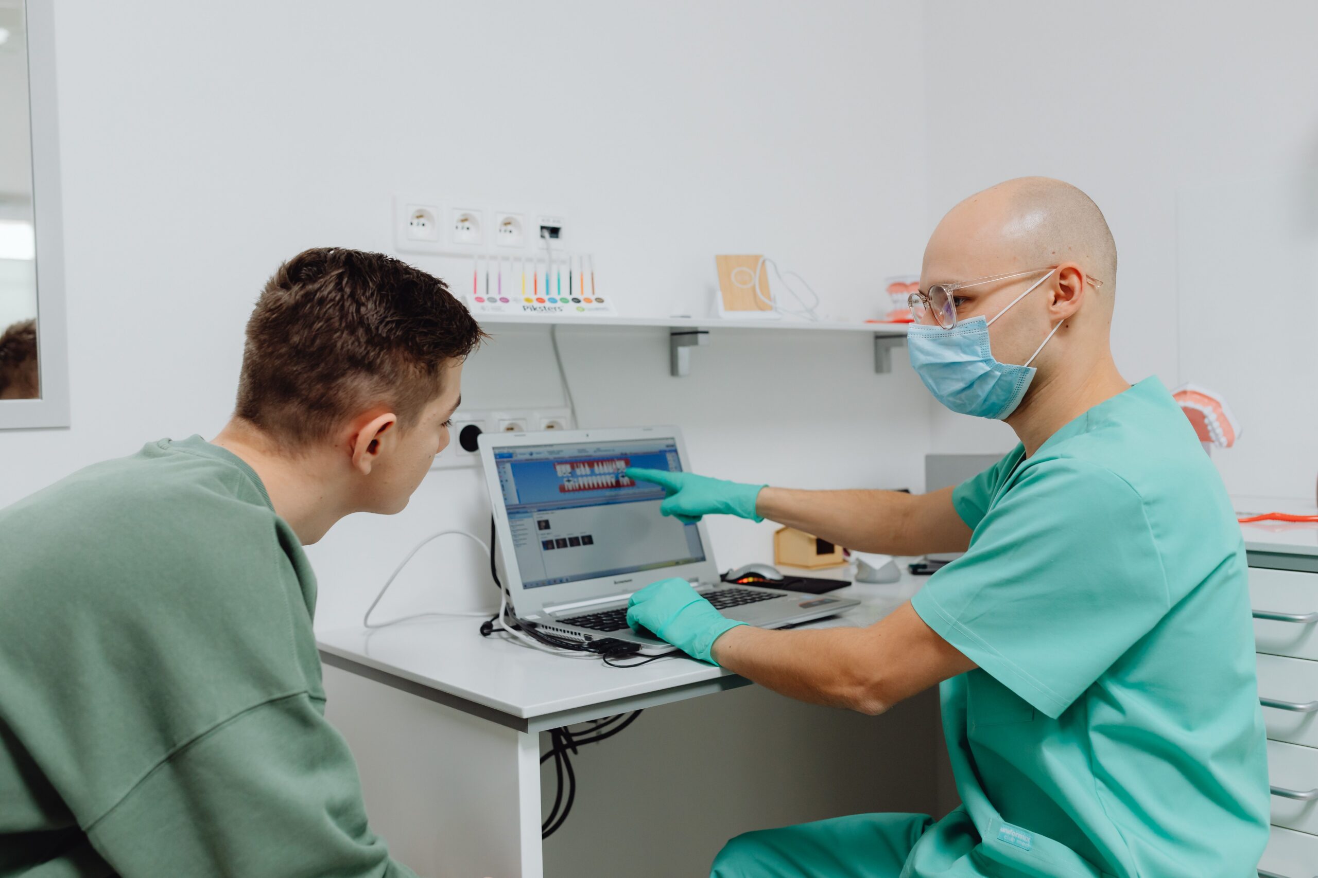 A patient discussing dental care with a professional