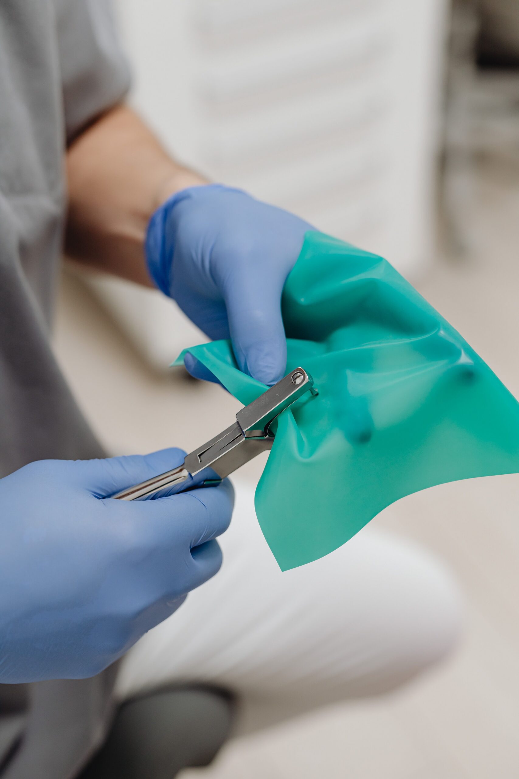 A dental professional discussing a tooth shade with a patient