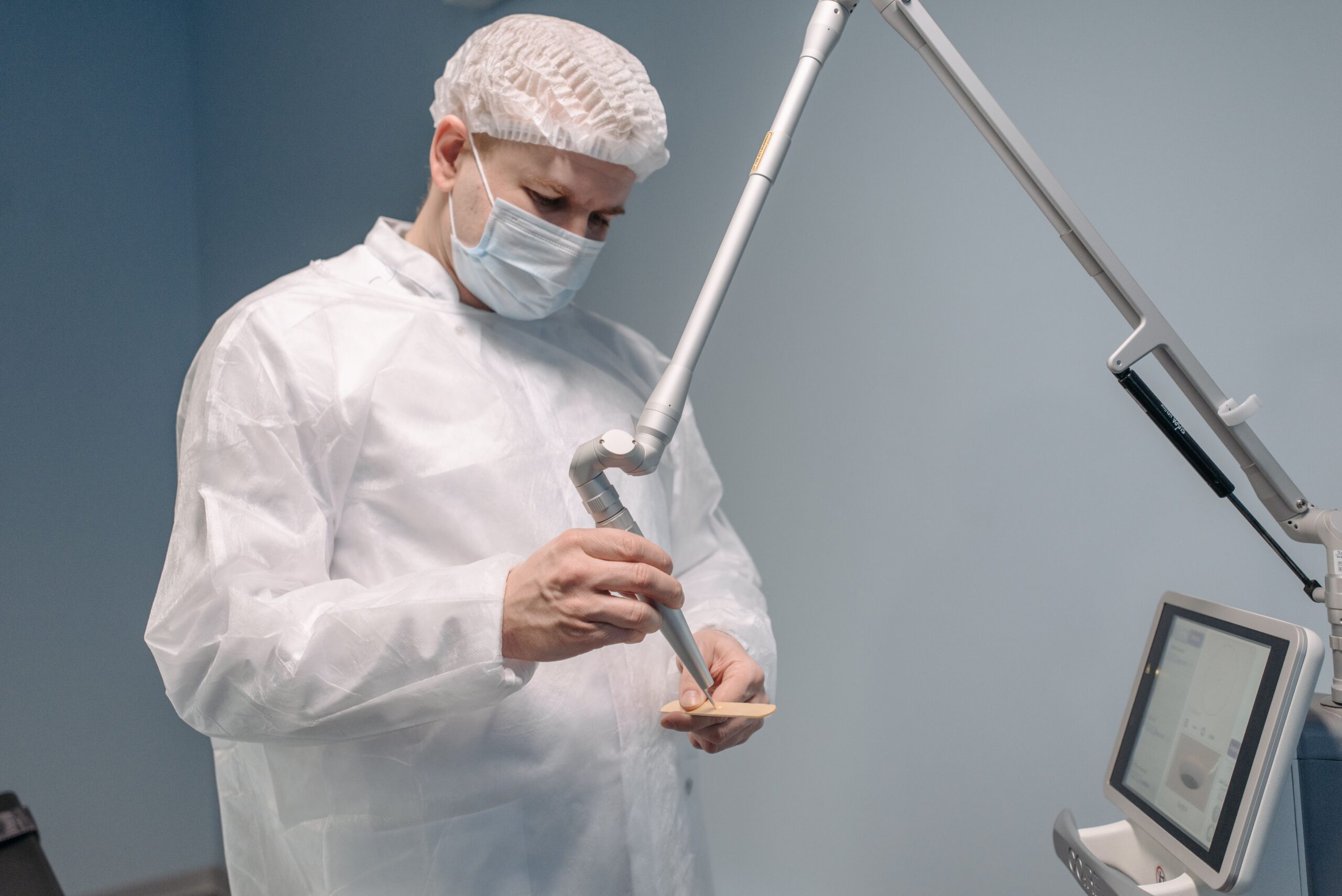 A dental professional discussing a tooth shade with a patient