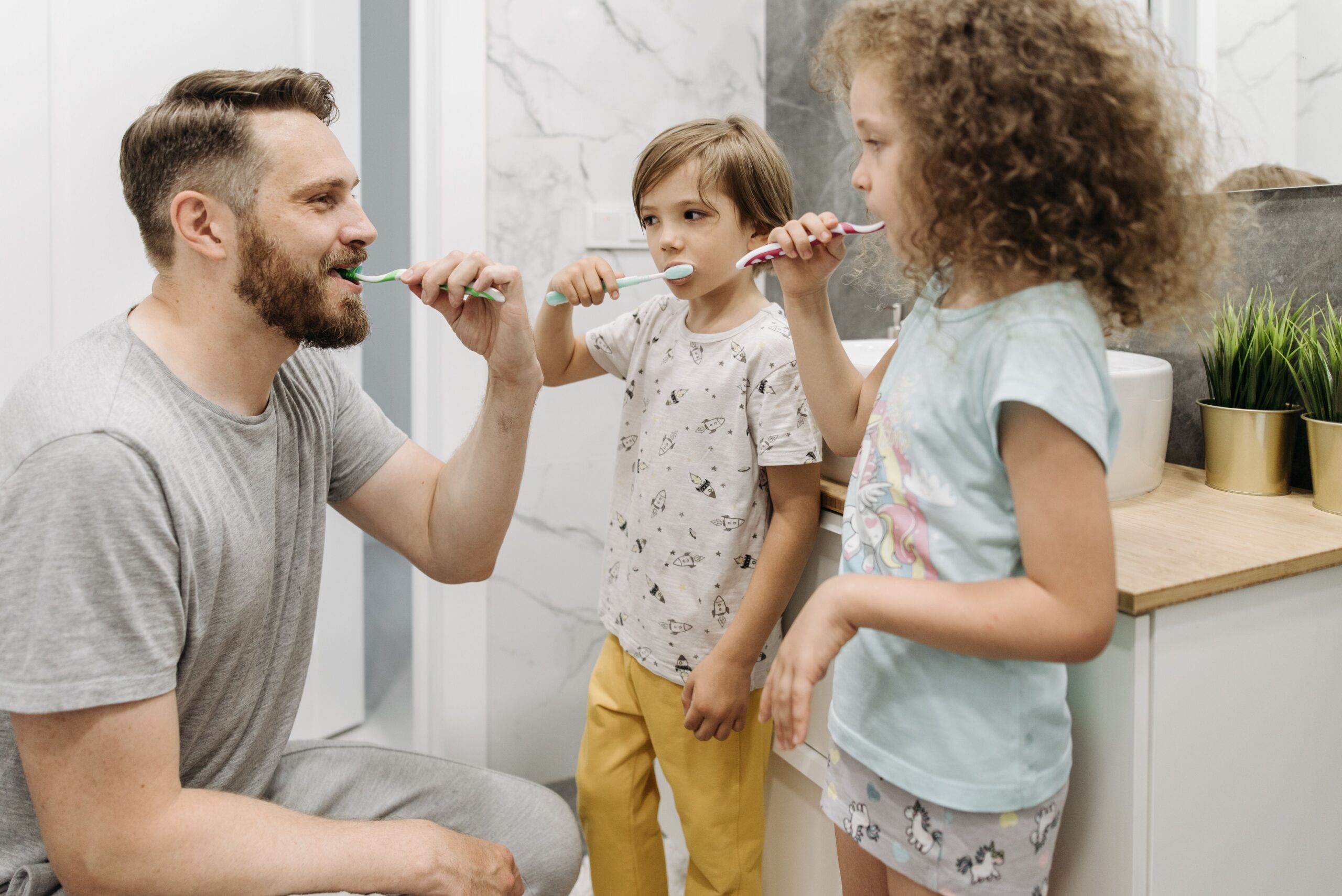 A dental professional discussing a tooth shade with a patient