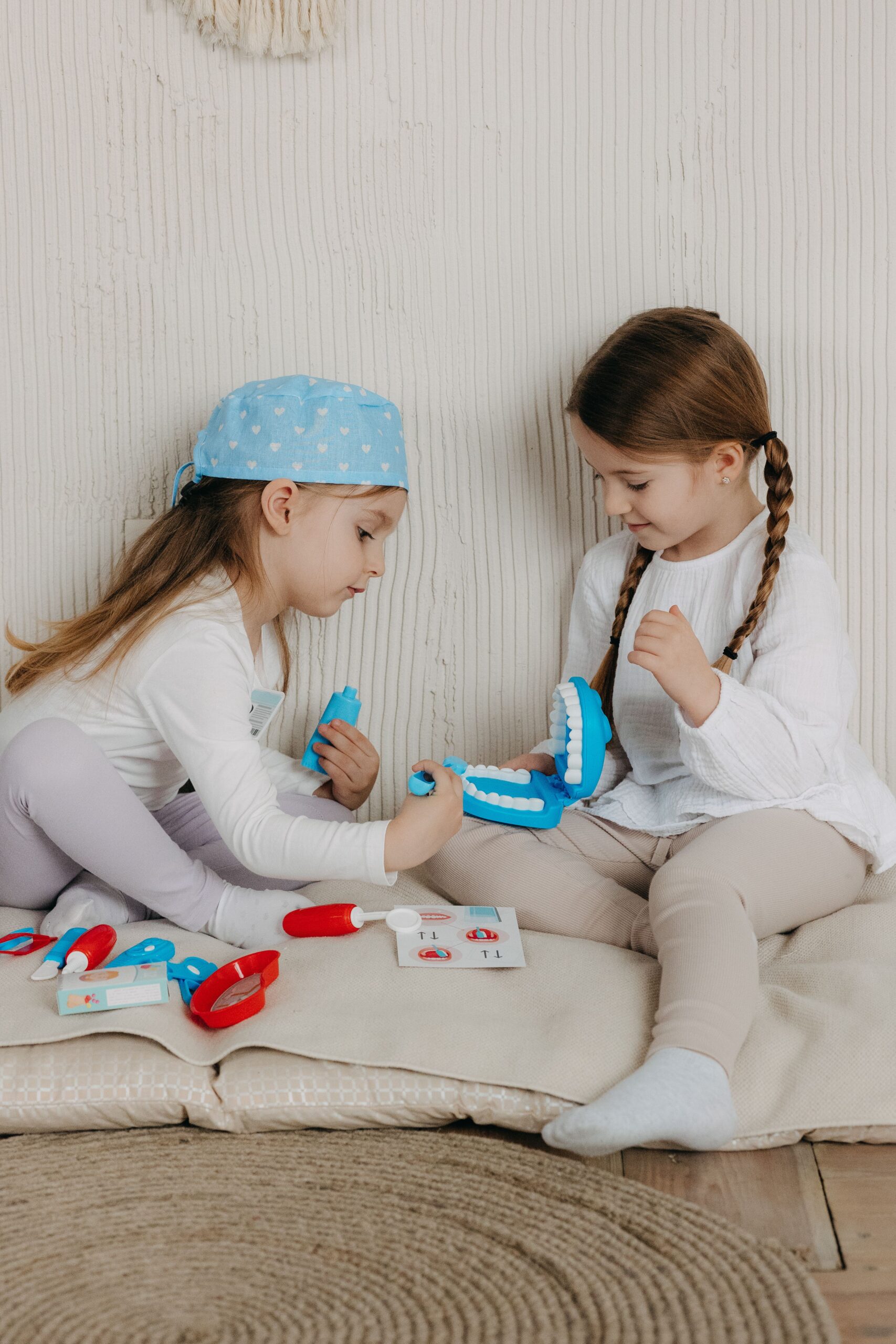 A dental professional discussing a tooth shade with a patient