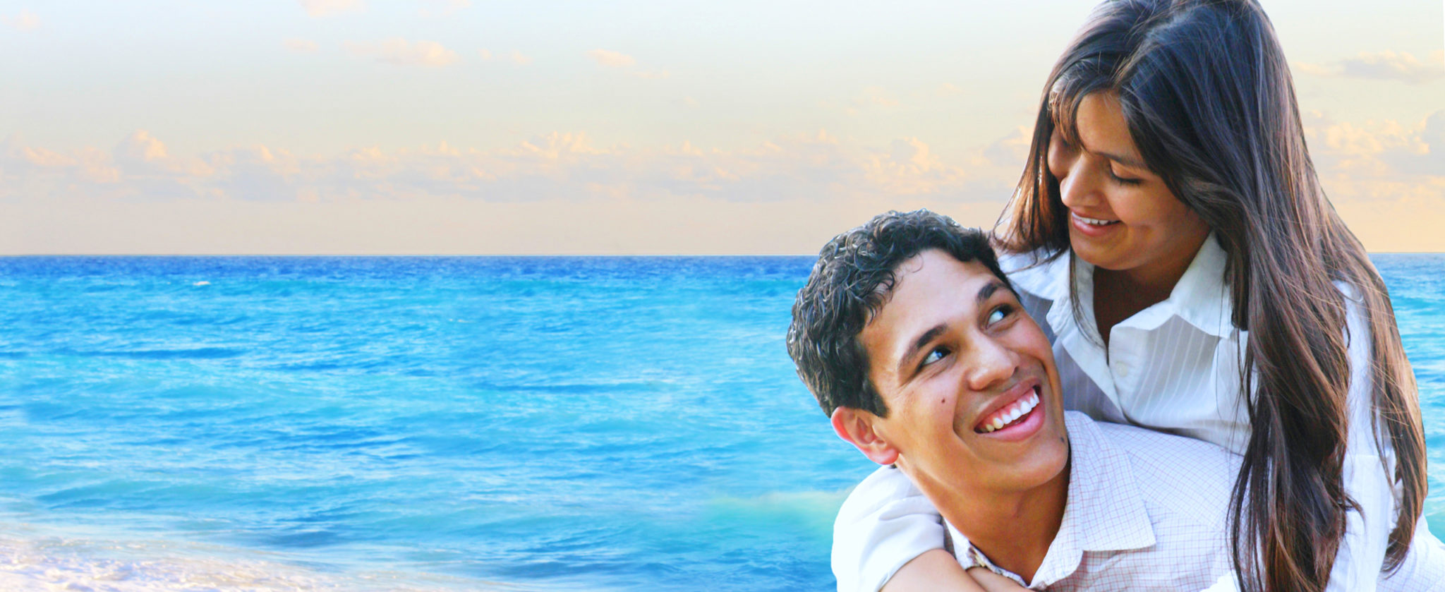 A smiling couple together outdoors